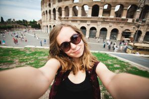 Girl-Rome-selfie-shutterstock_152914343